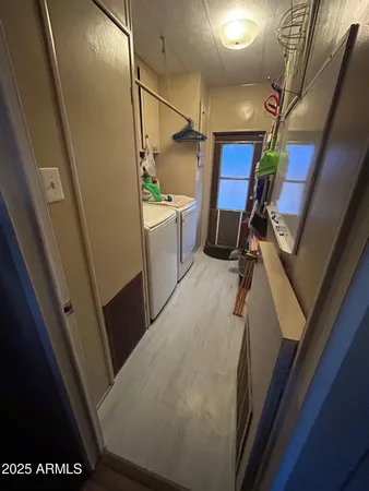 a view of a patio with table and chairs