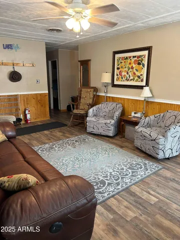 a bedroom with furniture and a bed