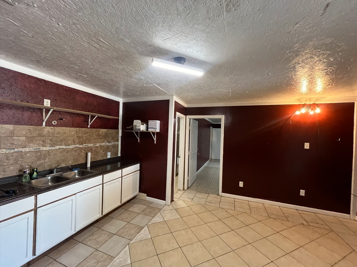 12926 Emmett Road Houston, TX 77041 - Photo 14 of 21 a kitchen with stainless steel appliances a refrigerator and a stove