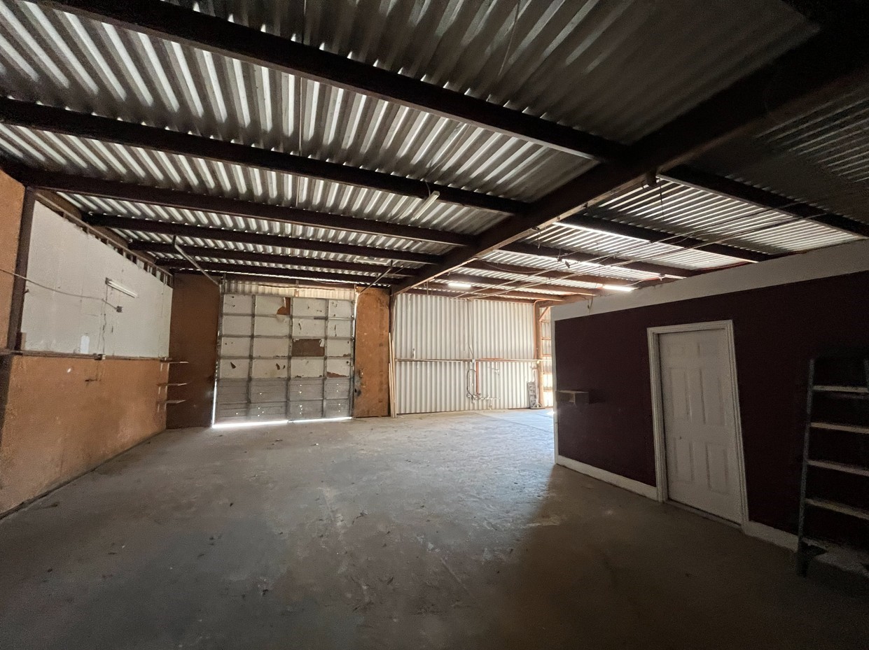 12926 Emmett Road Houston, TX 77041 - Photo 17 of 21 a view of an empty room with a window