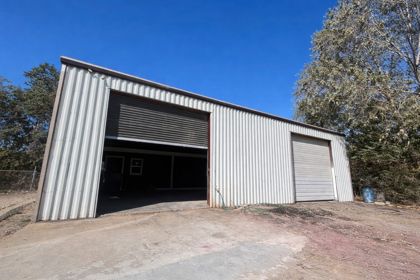 12926 Emmett Road Houston, TX 77041 - Photo 4 of 21 a view of wooden house and a yard