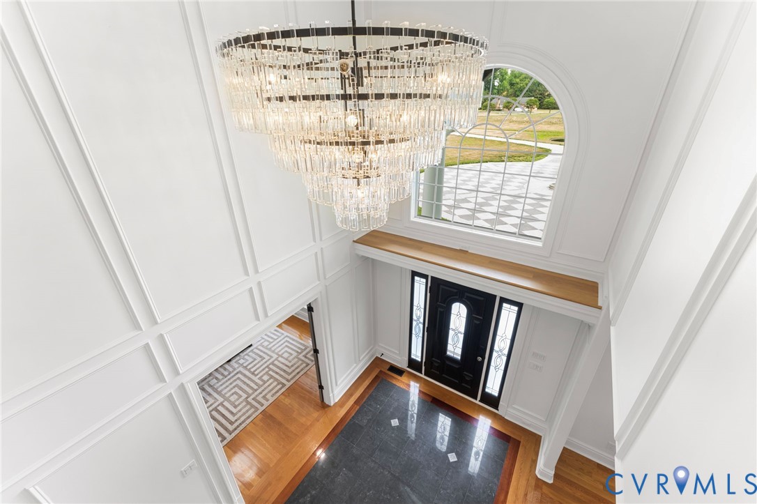13446 Bradley Bridge Road Chester, VA 23831 - Photo 47 of 98 Crystal chandelier with lift for easy cleaning.