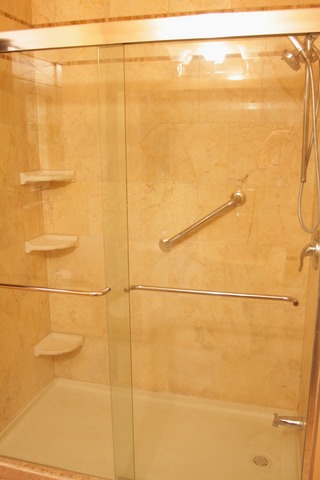 260 Timber Ridge Lane, Unit A Lake Barrington, IL 60010 - Photo 12 of 20 a bathroom with a shower