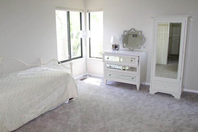 260 Timber Ridge Lane, Unit A Lake Barrington, IL 60010 - Photo 13 of 20 a bedroom with a bed and a window