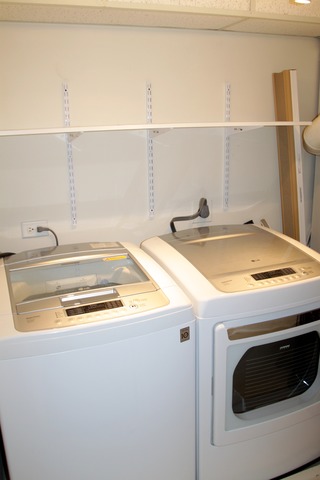 260 Timber Ridge Lane, Unit A Lake Barrington, IL 60010 - Photo 15 of 20 a utility room with dryer and washer