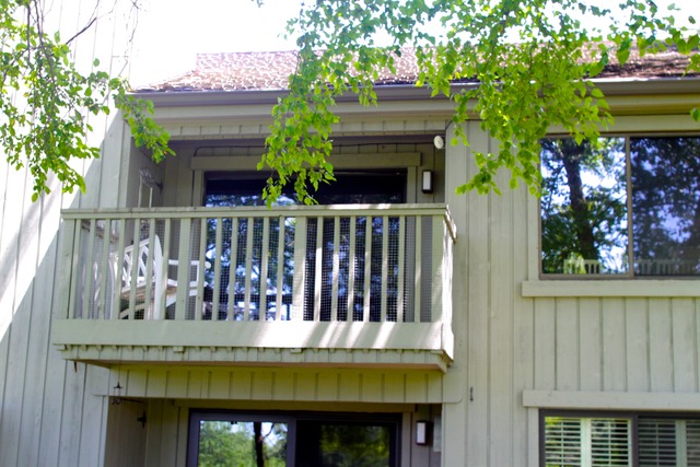 260 Timber Ridge Lane, Unit A Lake Barrington, IL 60010 - Photo 18 of 20 a view of a two chairs and table in the balcony