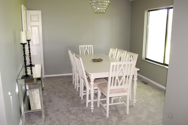 260 Timber Ridge Lane, Unit A Lake Barrington, IL 60010 - Photo 6 of 20 a view of a dining room with furniture and a window