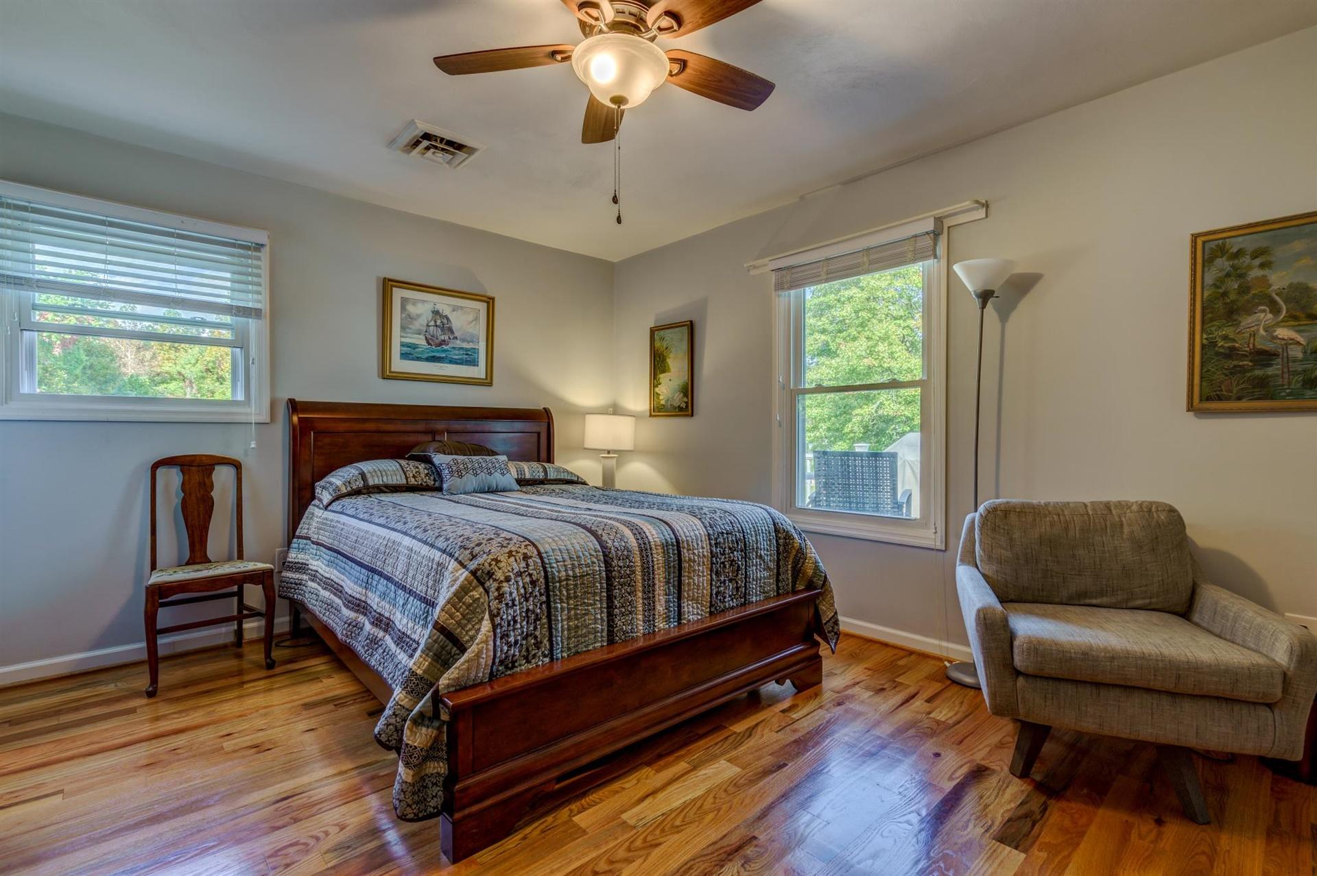 411 Monte Vista Road Union Hall, VA 24176 - Photo 14 of 45 a bedroom with a bed and a couch