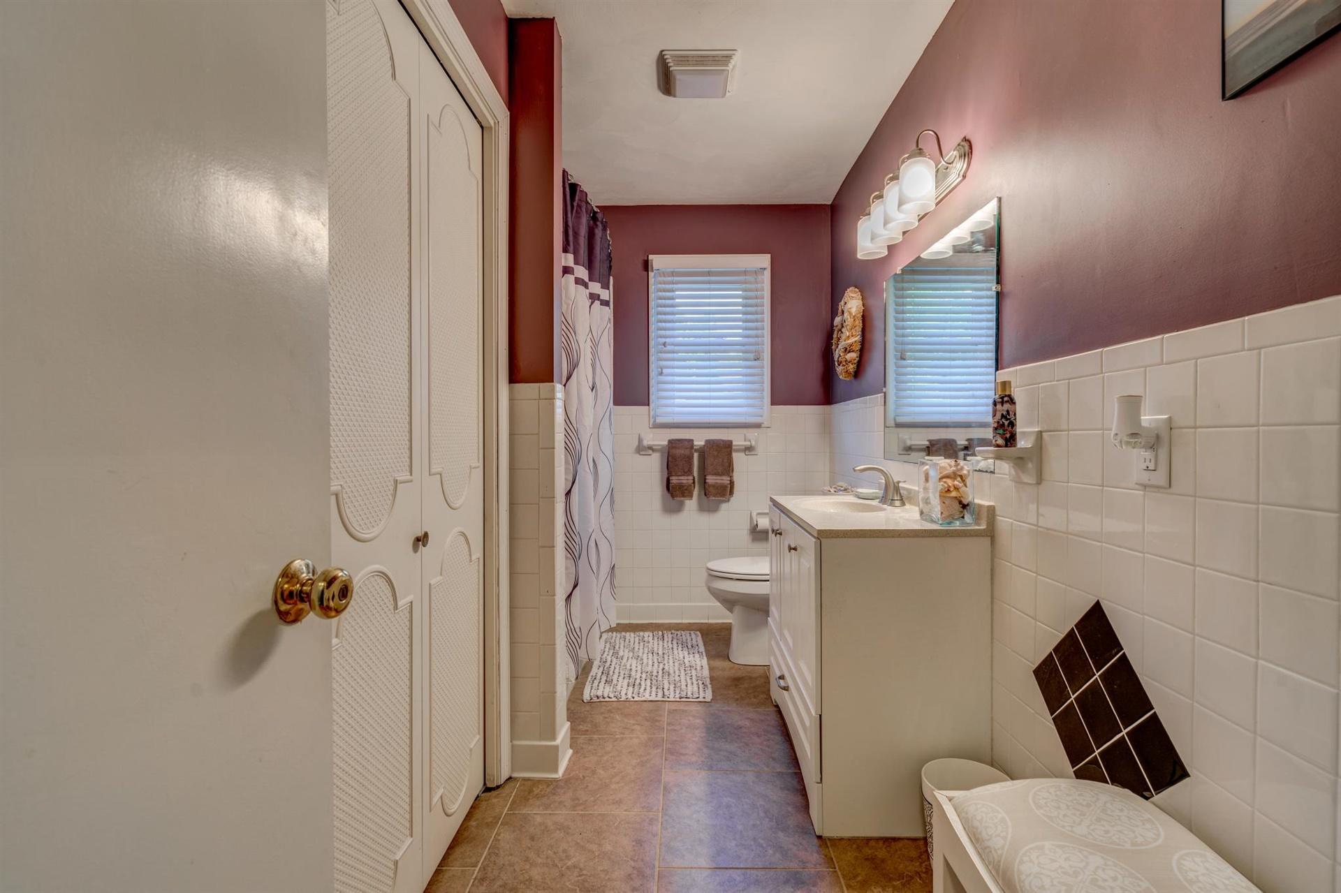 411 Monte Vista Road Union Hall, VA 24176 - Photo 17 of 45 a bathroom with a sink toilet and shower