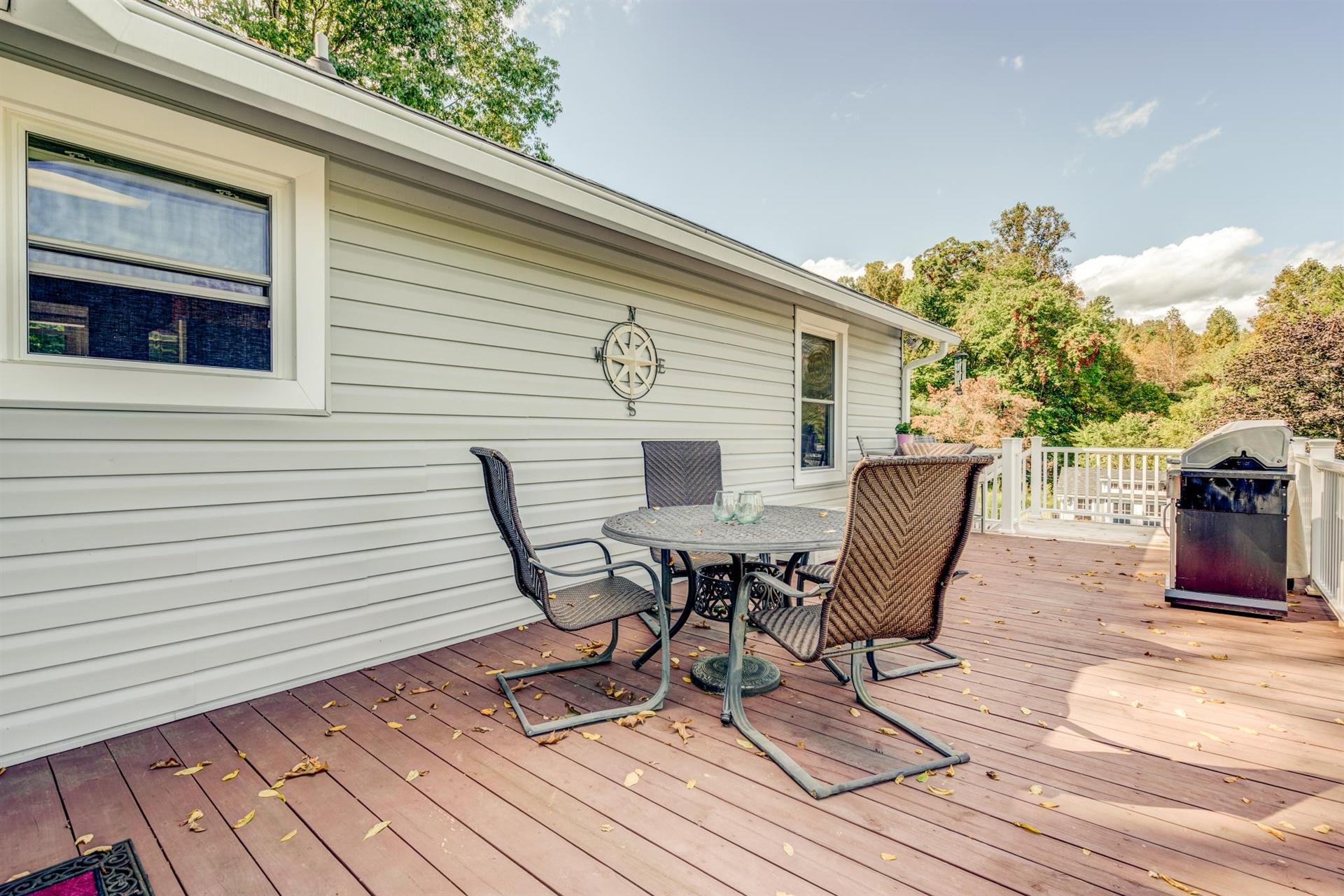 411 Monte Vista Road Union Hall, VA 24176 - Photo 20 of 45 a view of a terrace with wooden floor and outdoor seating