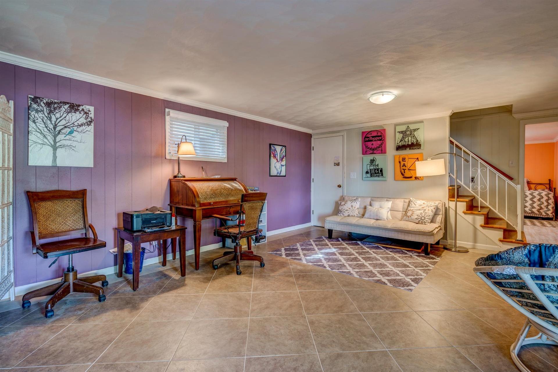411 Monte Vista Road Union Hall, VA 24176 - Photo 26 of 45 a bedroom with furniture and a couch