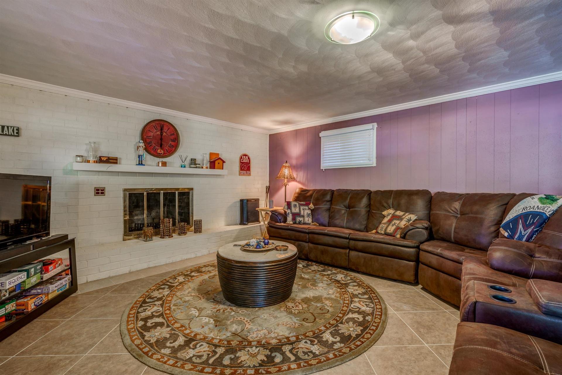 411 Monte Vista Road Union Hall, VA 24176 - Photo 27 of 45 a living room with furniture and a flat screen tv