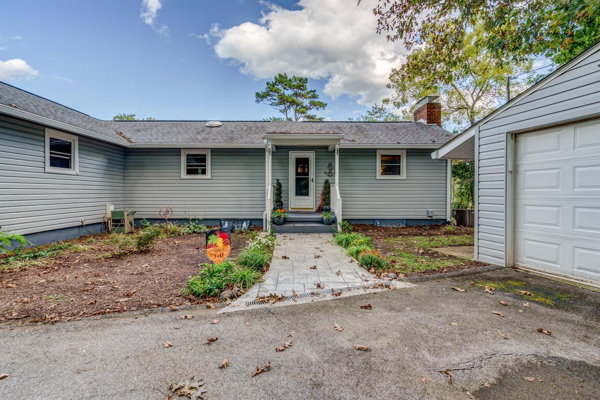 411 Monte Vista Road Union Hall, VA 24176 - Photo 4 of 45 a front view of a house with garden