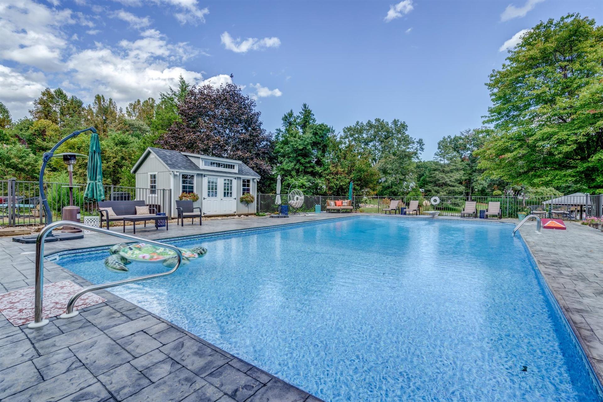 411 Monte Vista Road Union Hall, VA 24176 - Photo 38 of 45 swimming pool view with a seating space and garden view