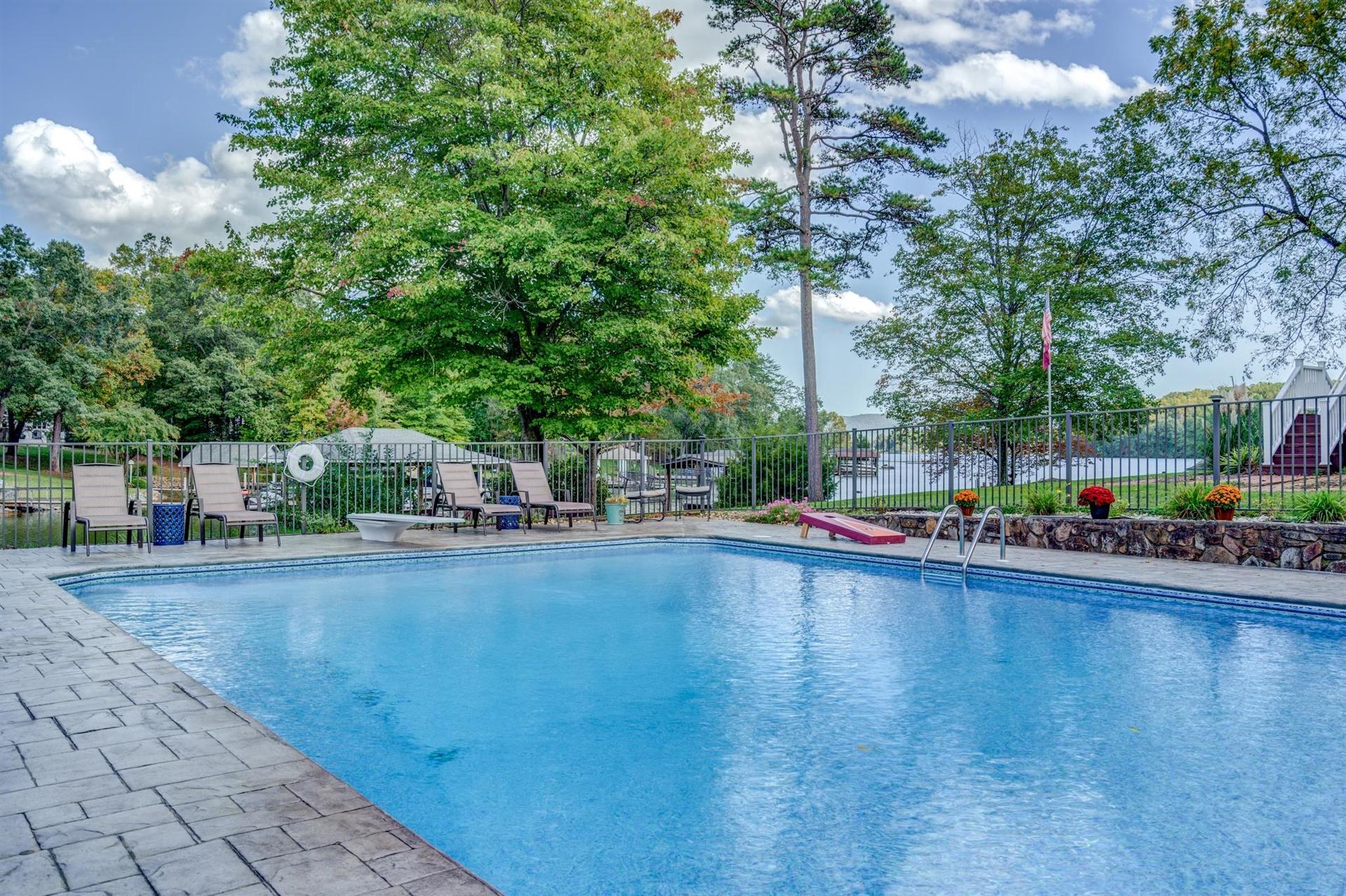 411 Monte Vista Road Union Hall, VA 24176 - Photo 39 of 45 a swimming pool with outdoor seating and yard