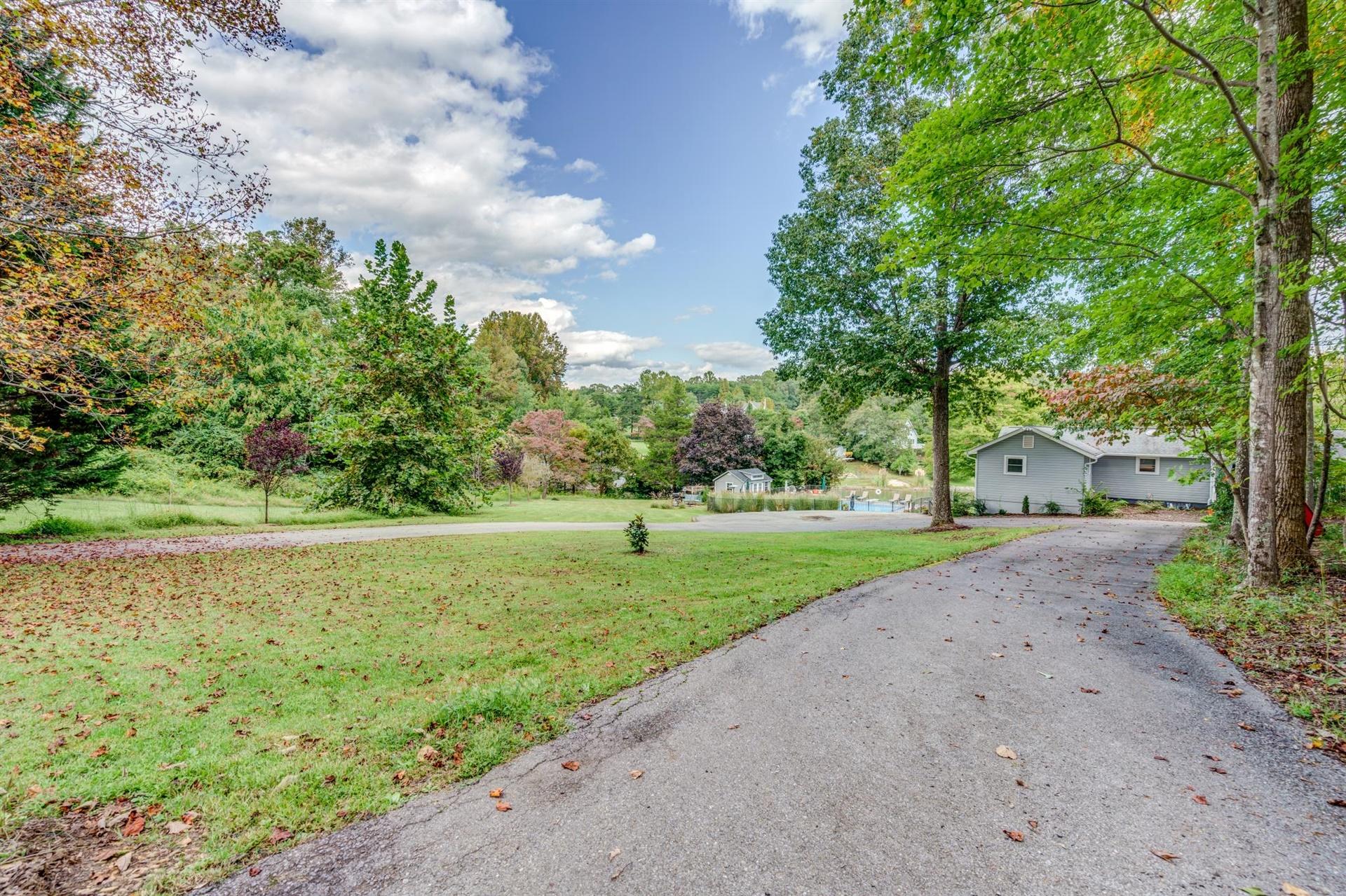 411 Monte Vista Road Union Hall, VA 24176 - Photo 44 of 45 a view of a park with large trees and cars parked