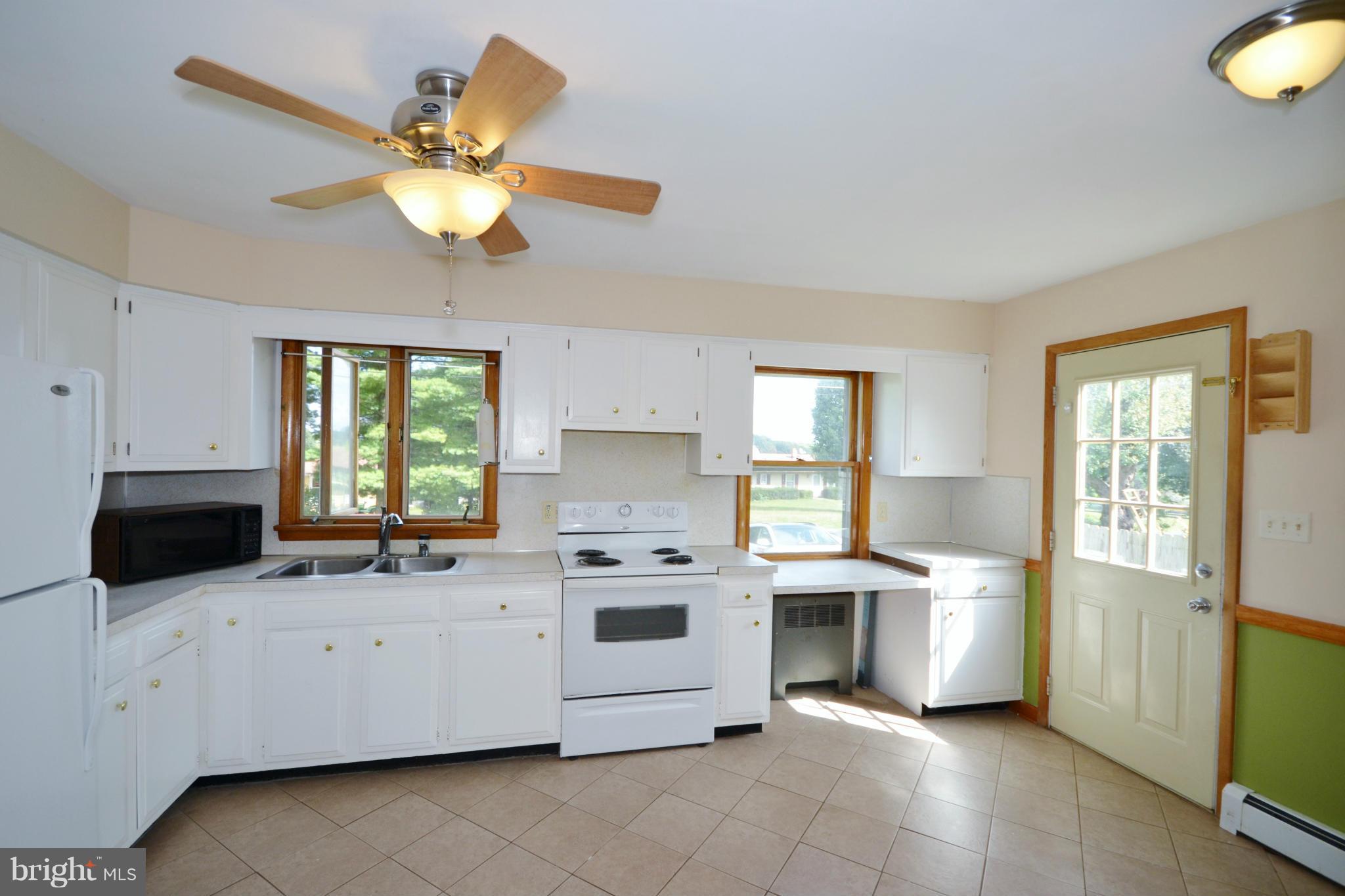 1031 Muller Road Westminster, MD 21157 - Photo 2 of 30 Ceramic floors, lots of light in bright kitchen