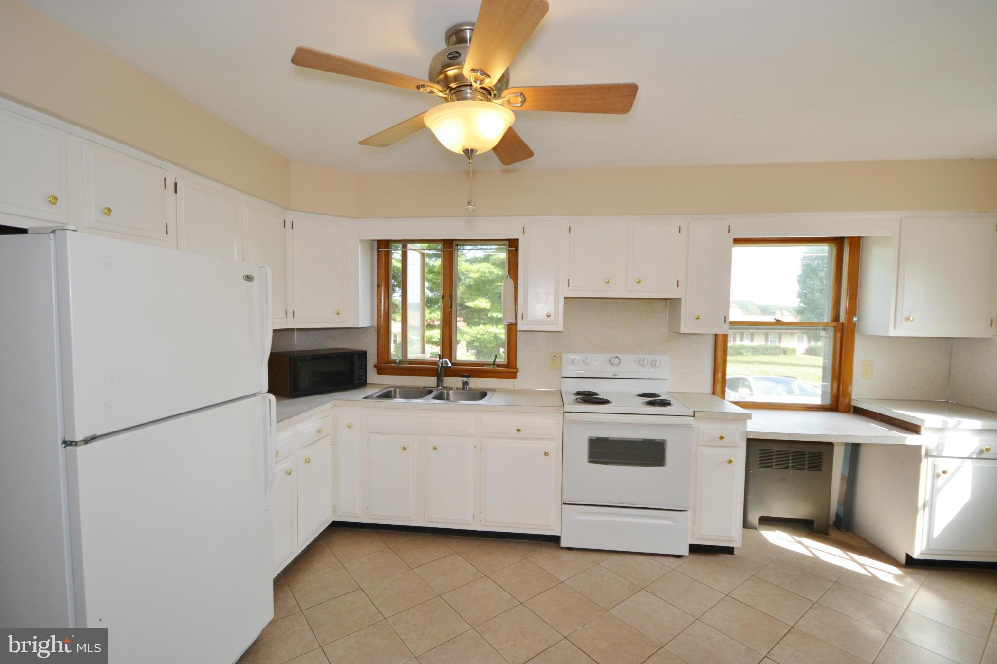 1031 Muller Road Westminster, MD 21157 - Photo 13 of 30 Plenty of cabinets in this kitchen!