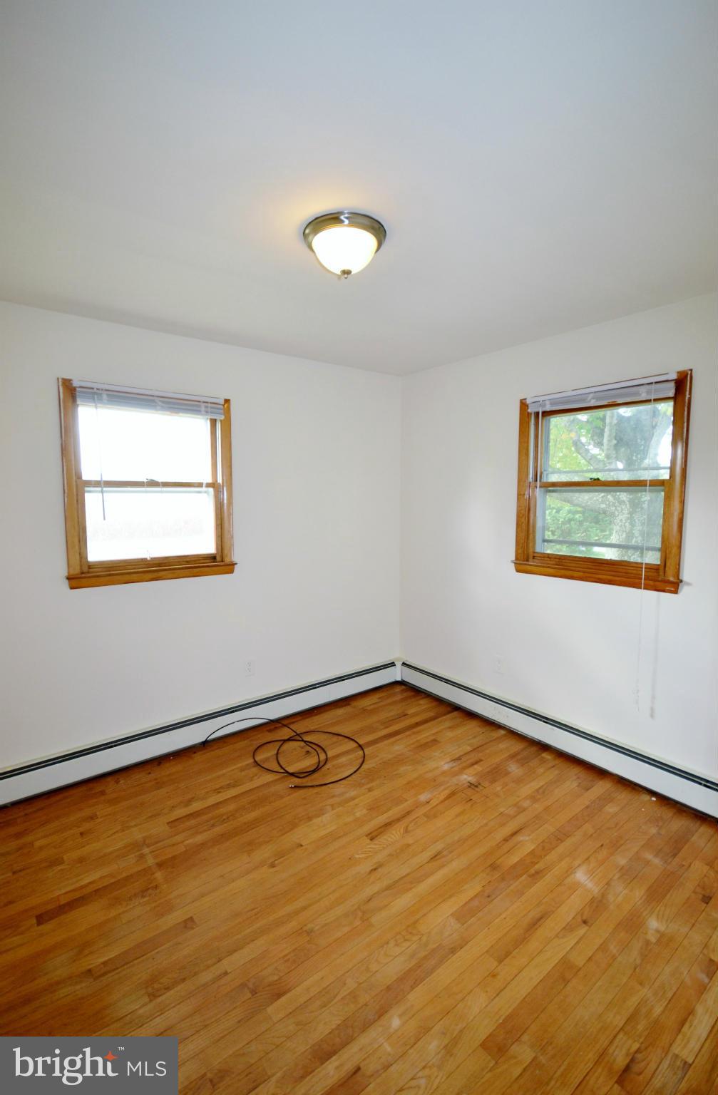 1031 Muller Road Westminster, MD 21157 - Photo 18 of 30 Third Bedroom w/ Hardwood Floor