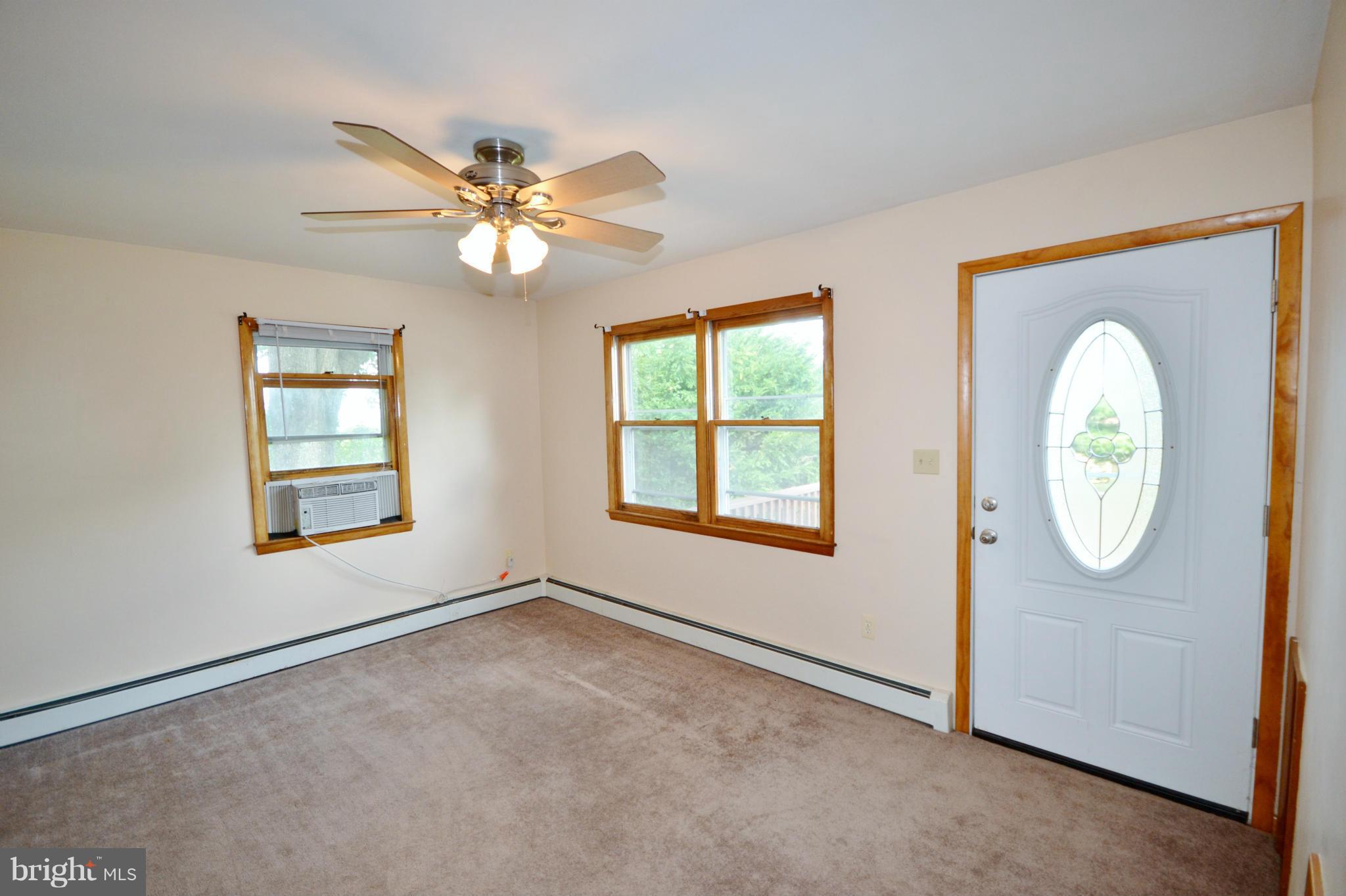 1031 Muller Road Westminster, MD 21157 - Photo 10 of 30 Living room has lots of lights, vinyl wrap windows