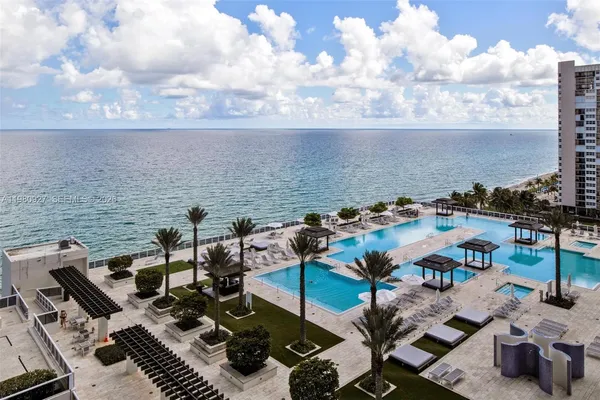 a view of a terrace with sitting area