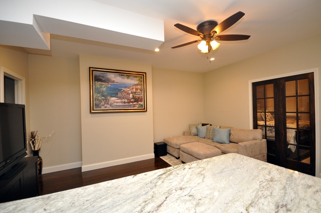 591 Beacon Street, Unit G Boston, MA 02215 - Photo 6 of 9 a bedroom with a large bed and a window