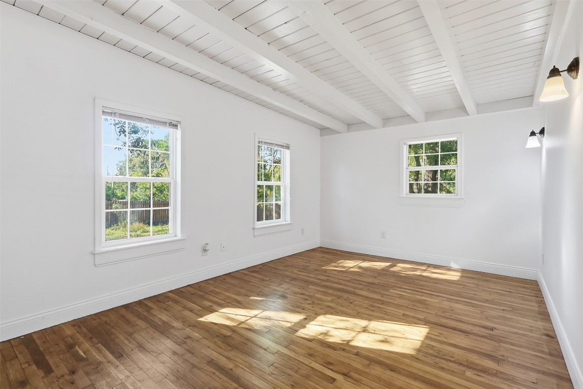 1215 Porter Street Taylor, TX 76574 - Photo 14 of 25 a view of empty room with wooden floor