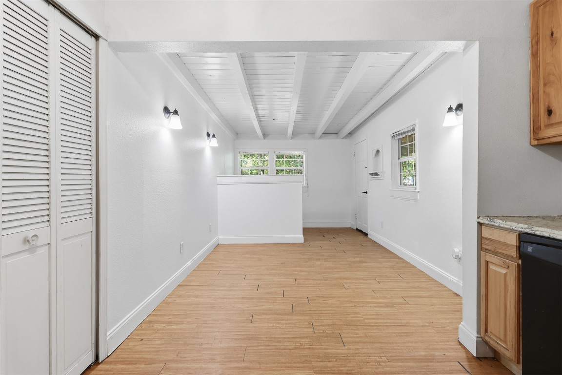 1215 Porter Street Taylor, TX 76574 - Photo 16 of 25 a view of an empty room with windows