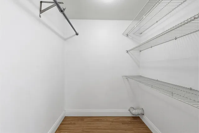 a view of a room with racks on the wall