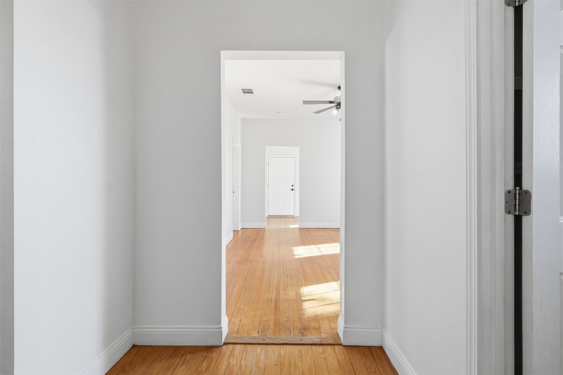 1215 Porter Street Taylor, TX 76574 - Photo 20 of 25 a view of a bathroom with a glass door