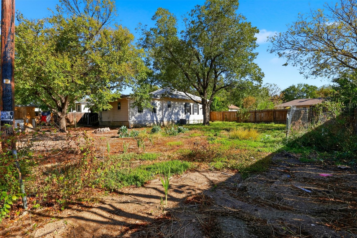 1215 Porter Street Taylor, TX 76574 - Photo 23 of 25 a view of backyard with tree