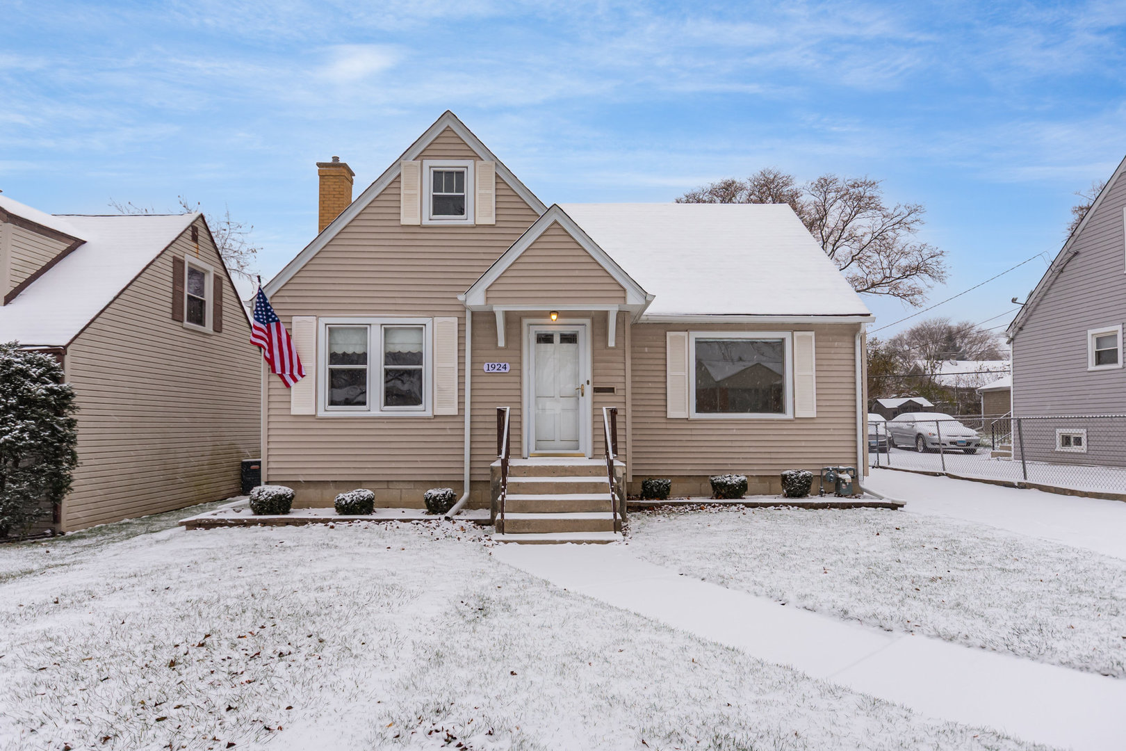 1924 Herbert Avenue Berkeley, IL 60163 - Photo 1 of 29 a front view of a house with a yard