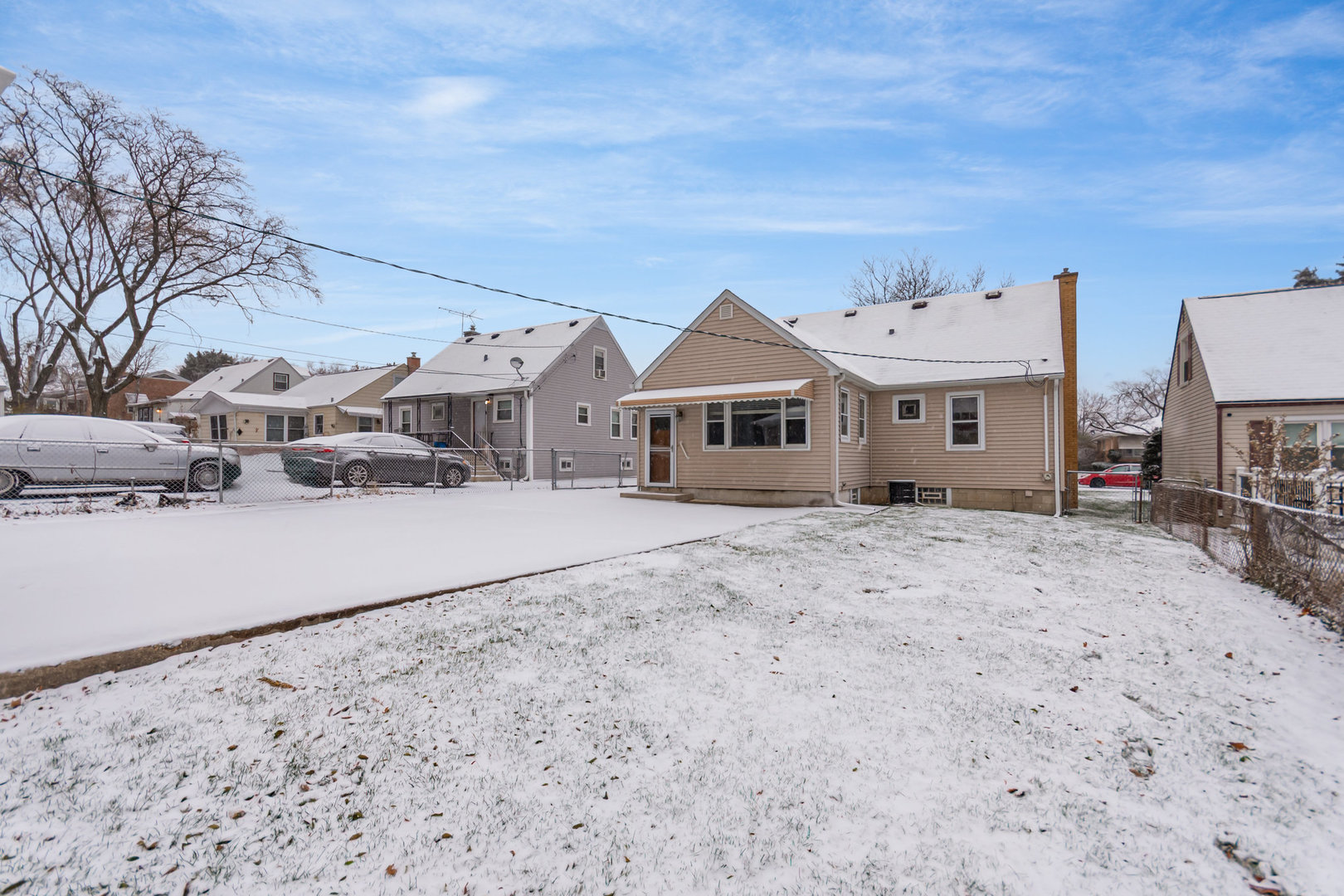1924 Herbert Avenue Berkeley, IL 60163 - Photo 23 of 29 a view of residential houses with snow on the road