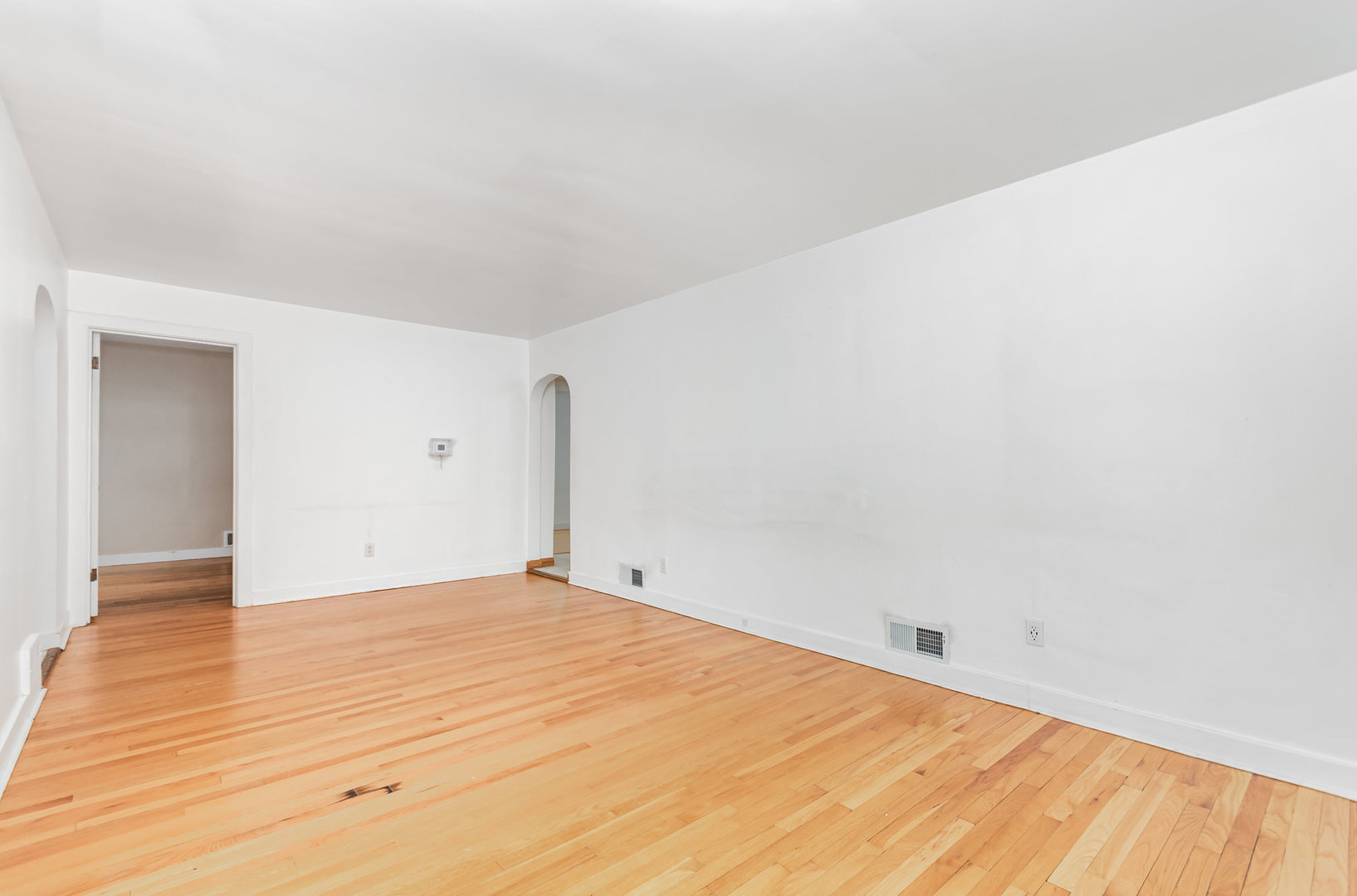 1924 Herbert Avenue Berkeley, IL 60163 - Photo 3 of 29 a view of empty room with wooden floor