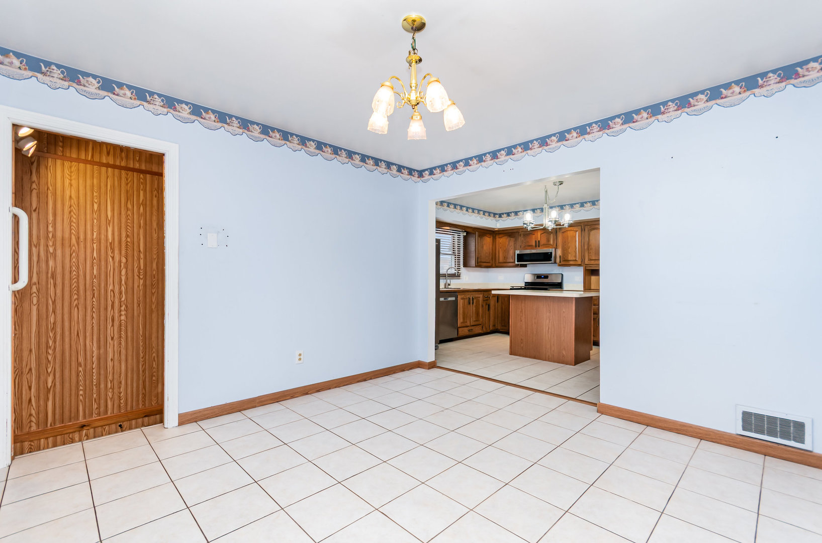 1924 Herbert Avenue Berkeley, IL 60163 - Photo 6 of 29 a view of a kitchen with a sink and cabinet