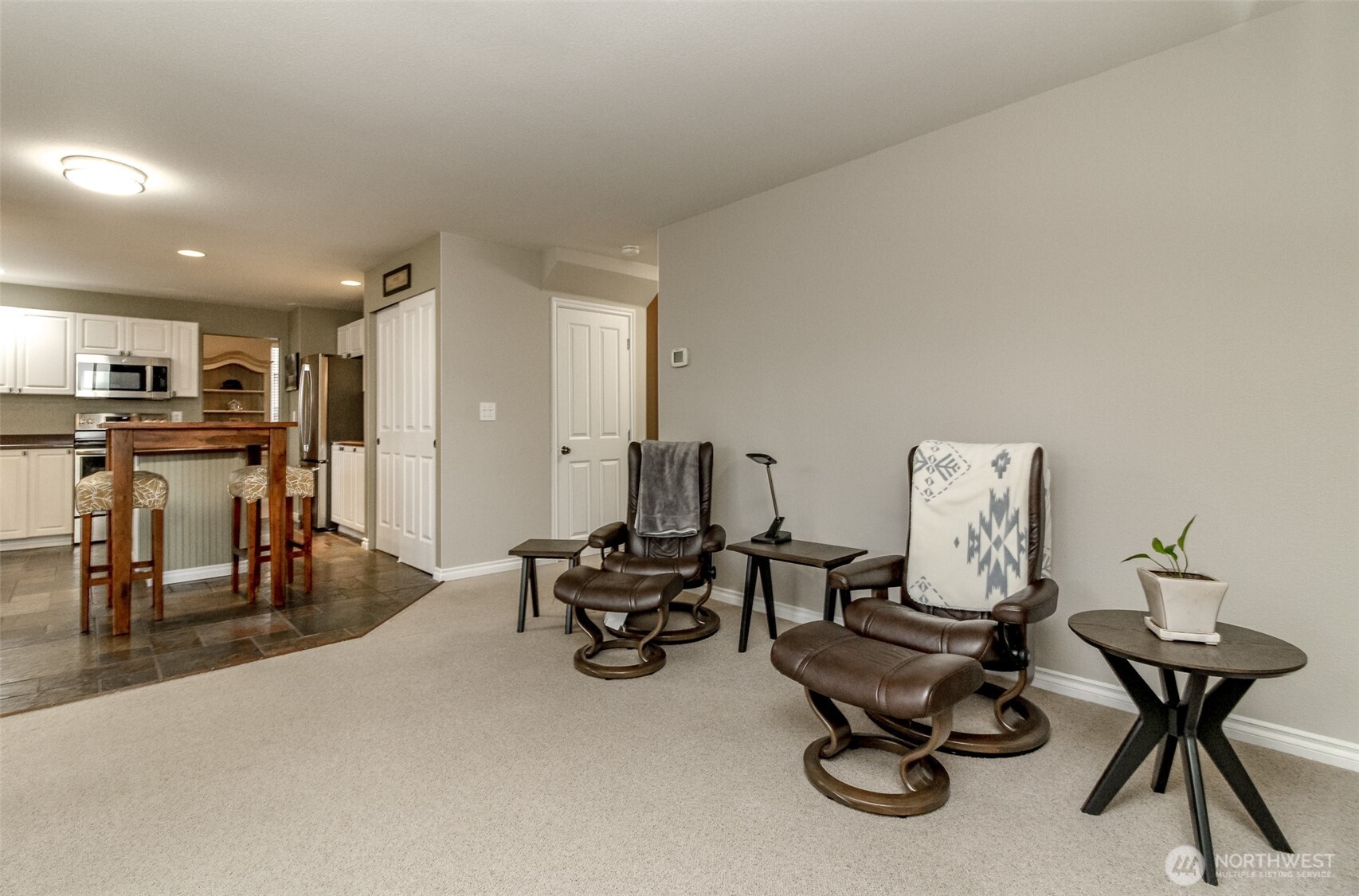23425 Southeast 248th Street Maple Valley, WA 98038 - Photo 17 of 40 a workspace with furniture and a table