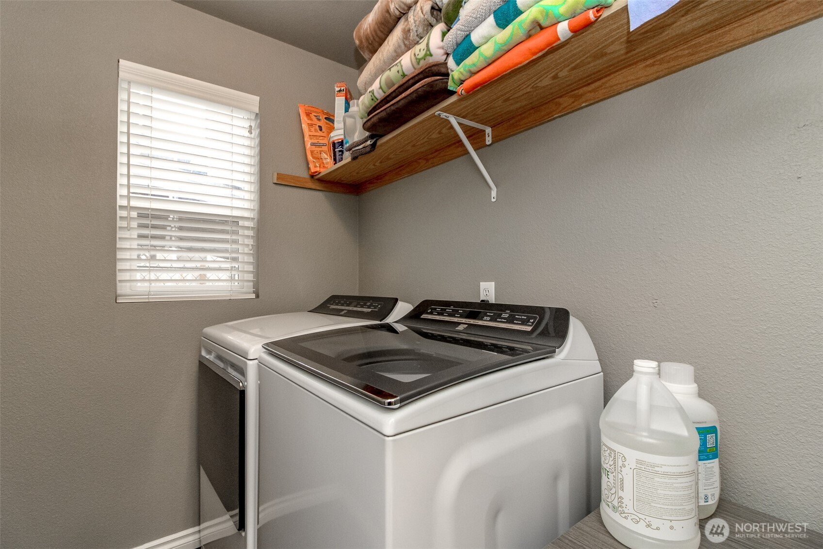 23425 Southeast 248th Street Maple Valley, WA 98038 - Photo 20 of 40 a utility room with dryer and washer