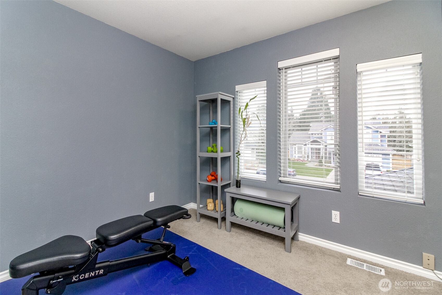 23425 Southeast 248th Street Maple Valley, WA 98038 - Photo 21 of 40 a living room with furniture and a window
