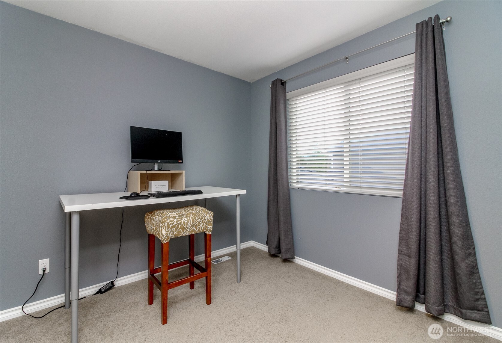 23425 Southeast 248th Street Maple Valley, WA 98038 - Photo 27 of 40 a view of a workspace with furniture and a window