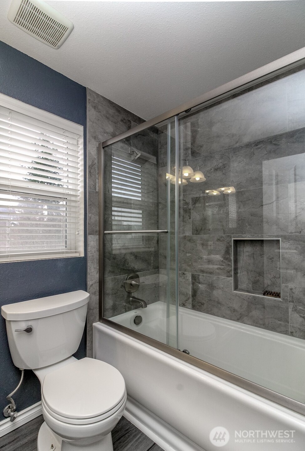 23425 Southeast 248th Street Maple Valley, WA 98038 - Photo 29 of 40 a bathroom with a toilet and a shower