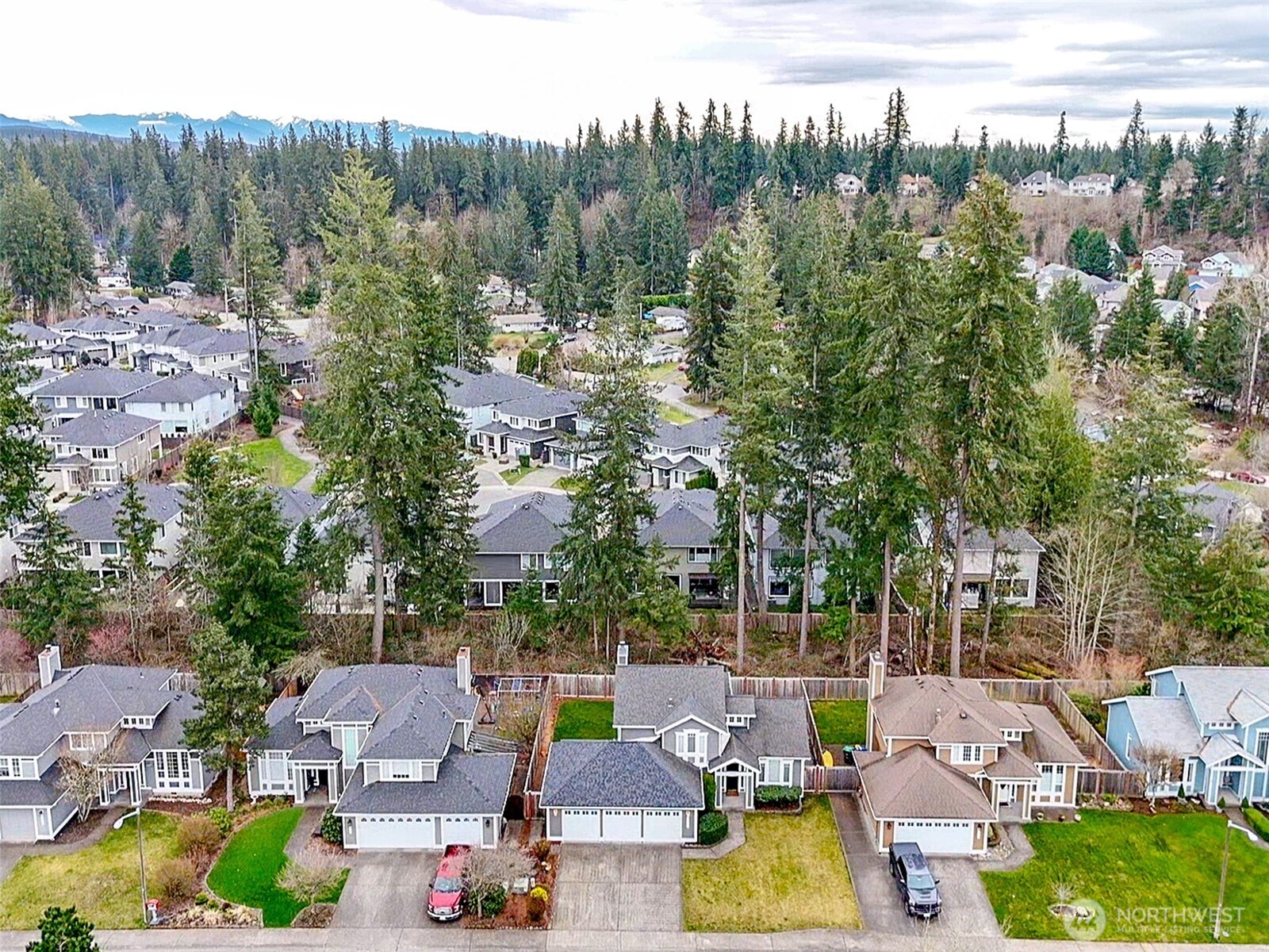 23425 Southeast 248th Street Maple Valley, WA 98038 - Photo 37 of 40 an aerial view of residential houses with outdoor space and street view