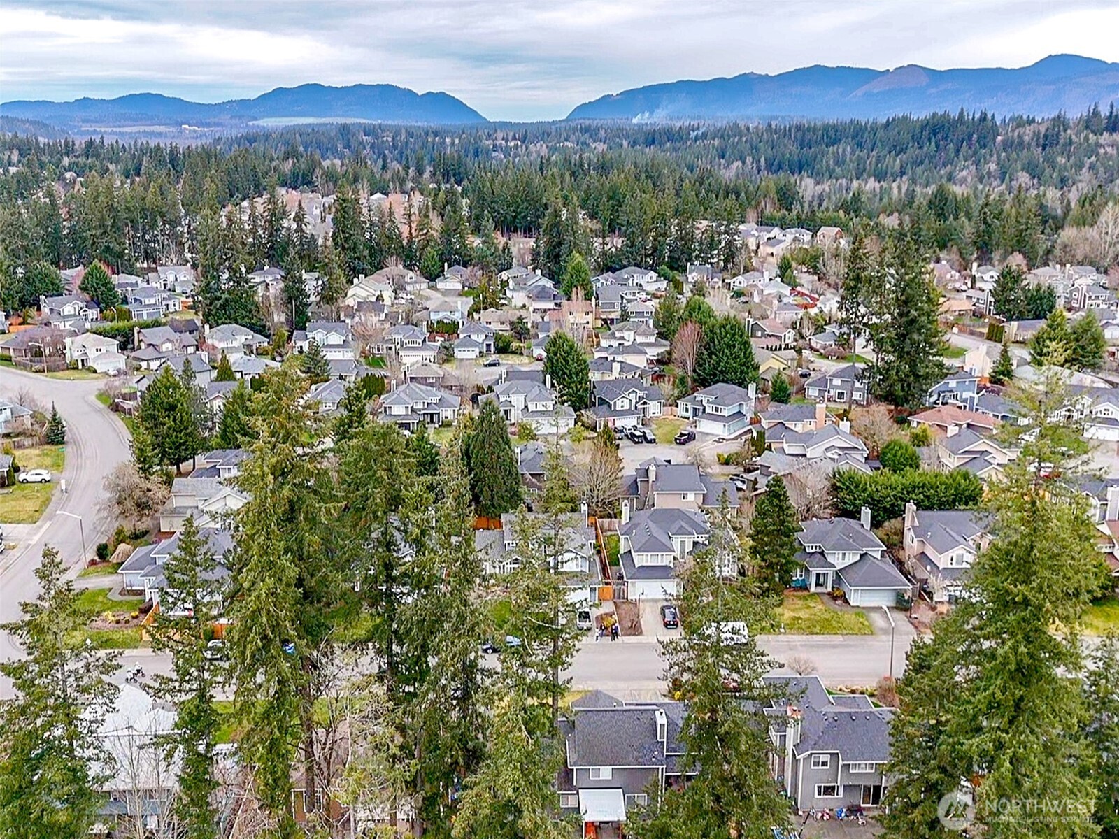 23425 Southeast 248th Street Maple Valley, WA 98038 - Photo 39 of 40 a view of a city with mountain