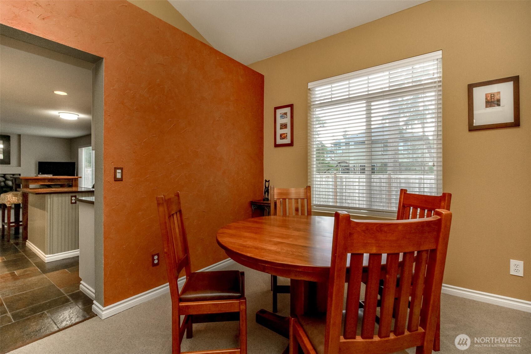 23425 Southeast 248th Street Maple Valley, WA 98038 - Photo 9 of 40 a view of a dining room with furniture and window