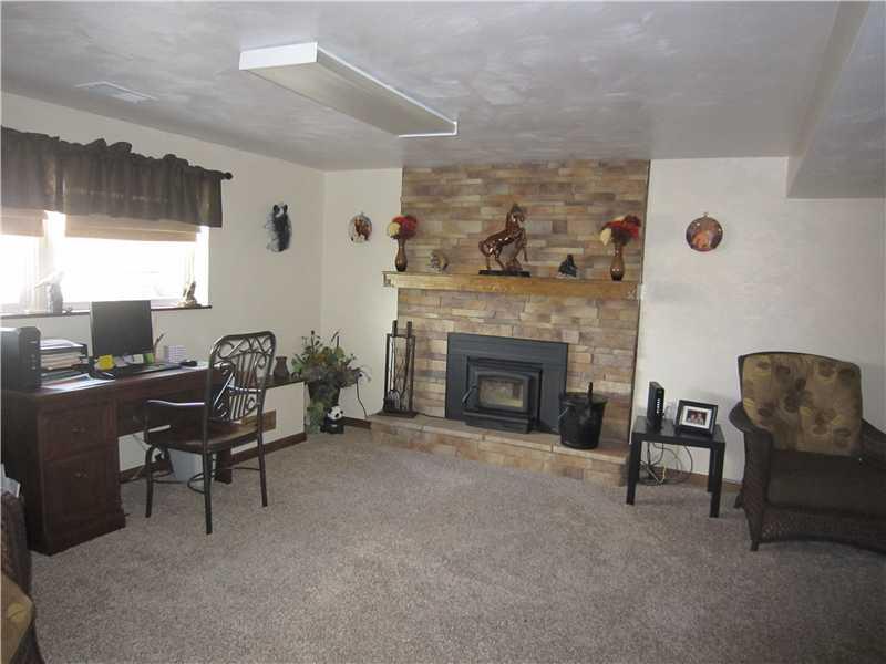 11520 Drop Road North Huntingdon, PA 15642 - Photo 16 of 25 Den/Family/Great Room. Beautiful new game room with stone wall and wood burner