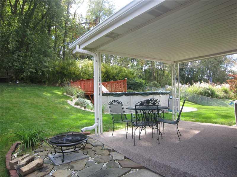 11520 Drop Road North Huntingdon, PA 15642 - Photo 4 of 25 Patio/Deck. Large covered patio and fire pit