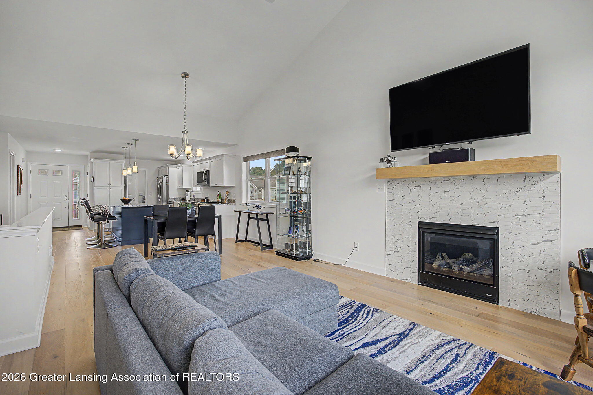 4056 Eastbridge Road Stockbridge, MI 49285 - Photo 21 of 30 Living room towards dining area