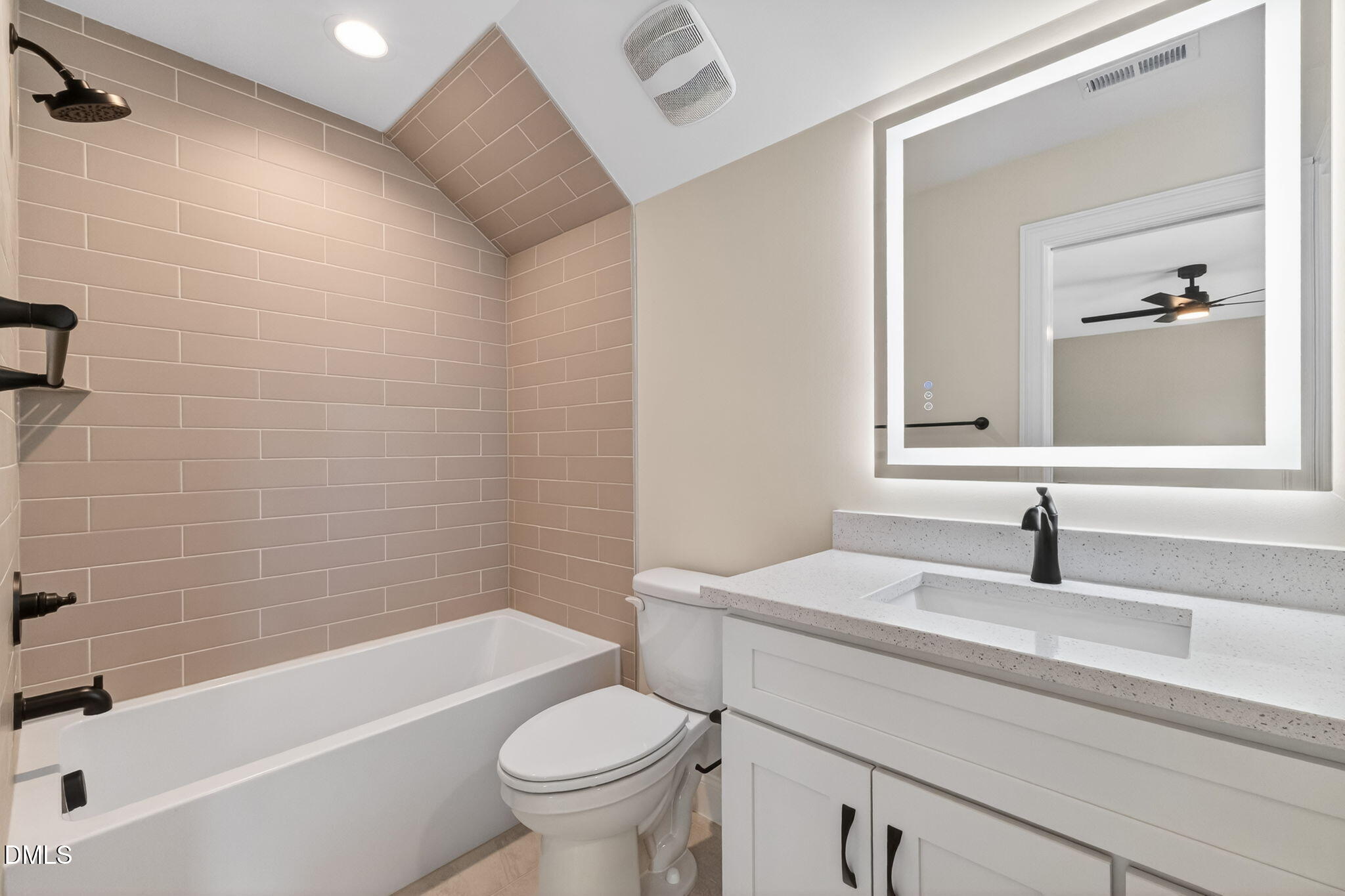 651 Dixon Road, Unit (LOT 2A) Willow Spring, NC 27592 - Photo 50 of 77 a bathroom with a sink a toilet and a bathtub