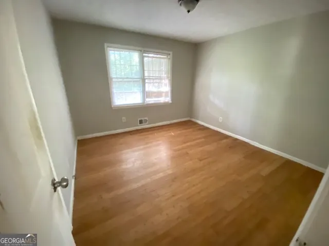 an empty room with windows