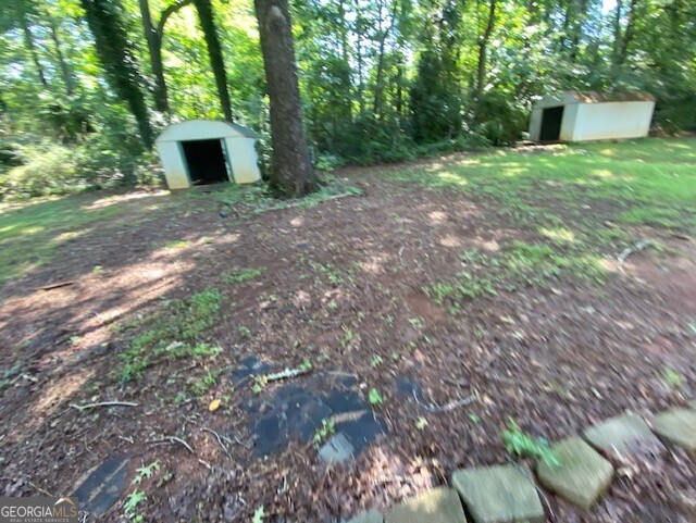 203 Farmbrook Parkway Stockbridge, GA 30281 - Photo 22 of 25 a view of a outdoor space with deck and tree