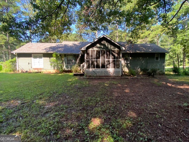 203 Farmbrook Parkway Stockbridge, GA 30281 - Photo 25 of 25 a front view of a house with garden